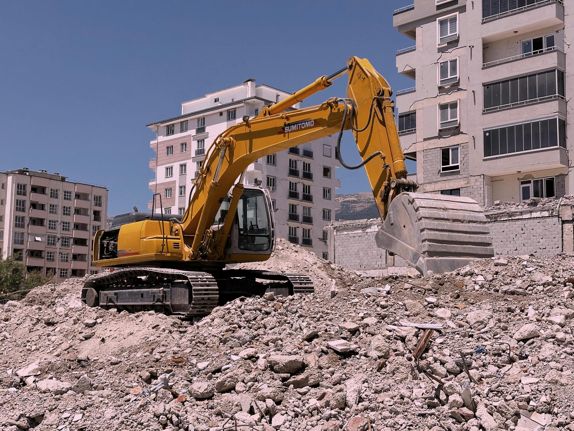 Commercial apartment building demolition in progress in Metro Detroit