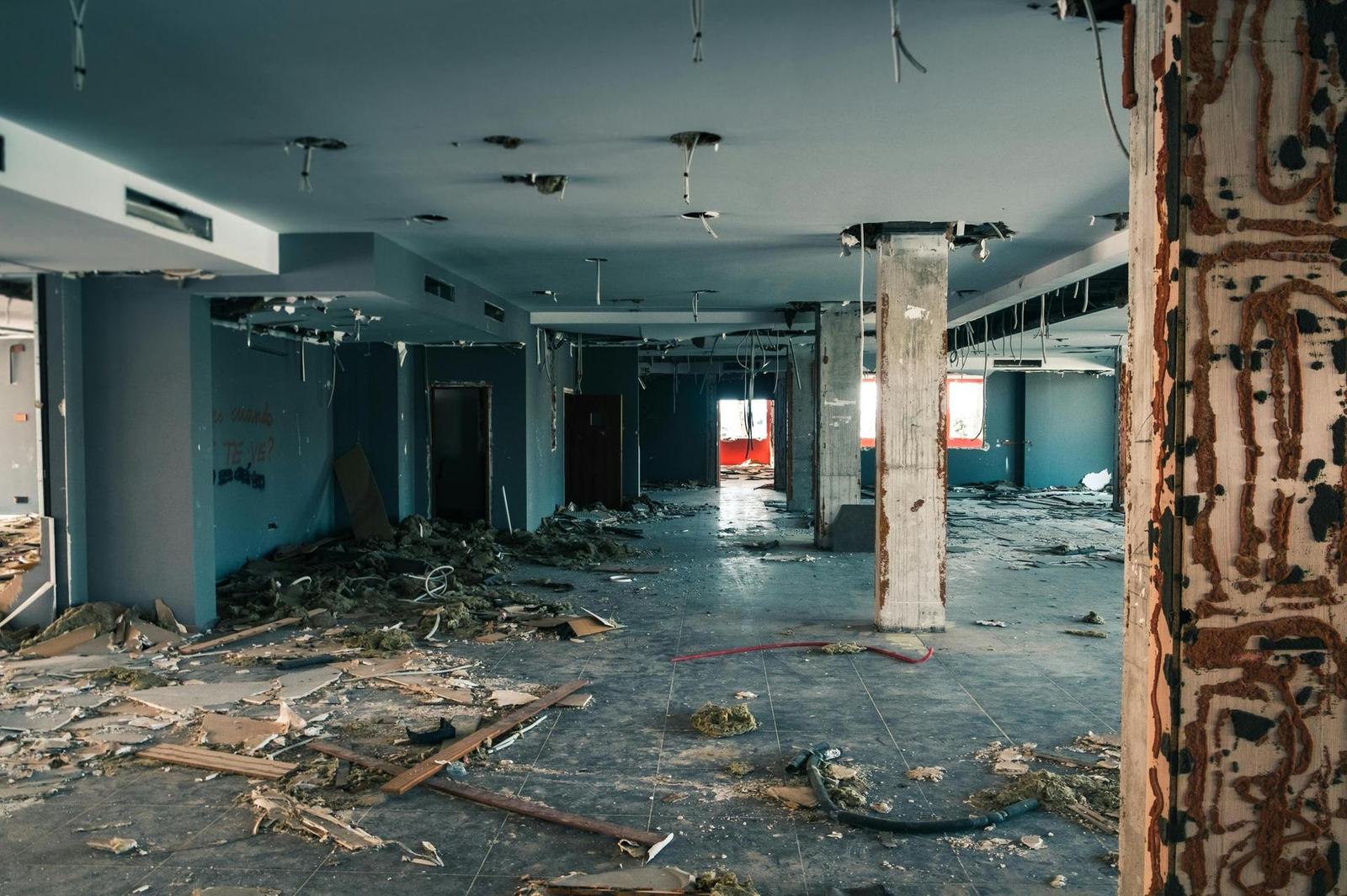Interior gut-out exposing wall and ceiling materials in an older Metro Detroit home